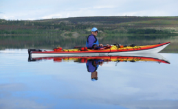 Kayaking on the amazingly flat Puntzi Lake, west of
                        Williams Lake, BC